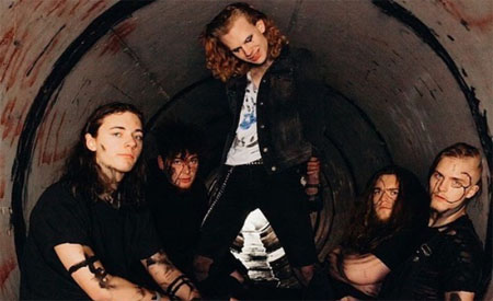 A group photo of Vended band.